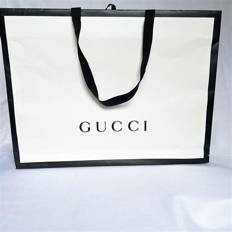 gucci new paper bag|gucci paper shopping bag.